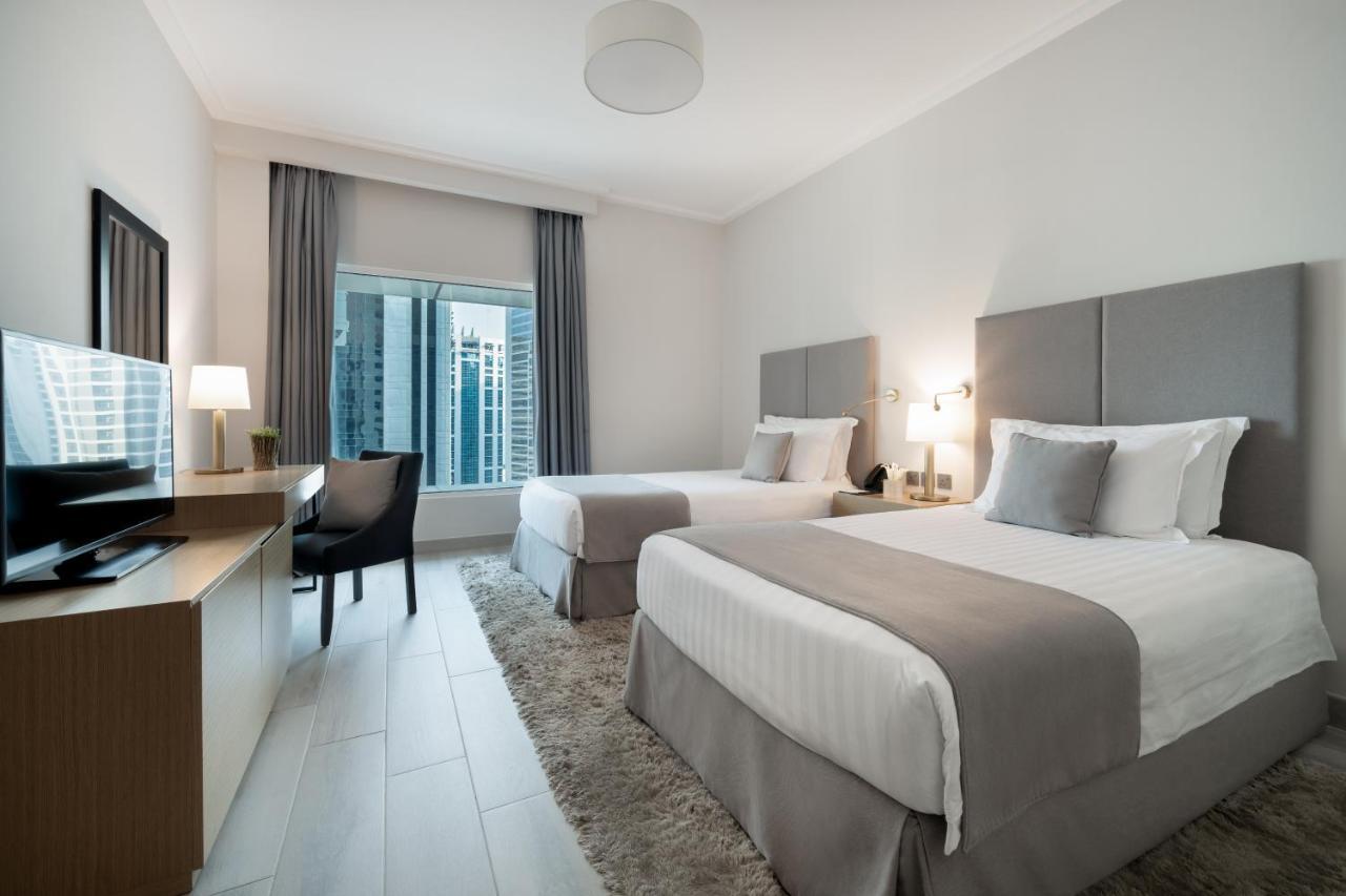 Centara West Bay Hotel & Residences Doha Exterior foto A typical guest room at the hotel