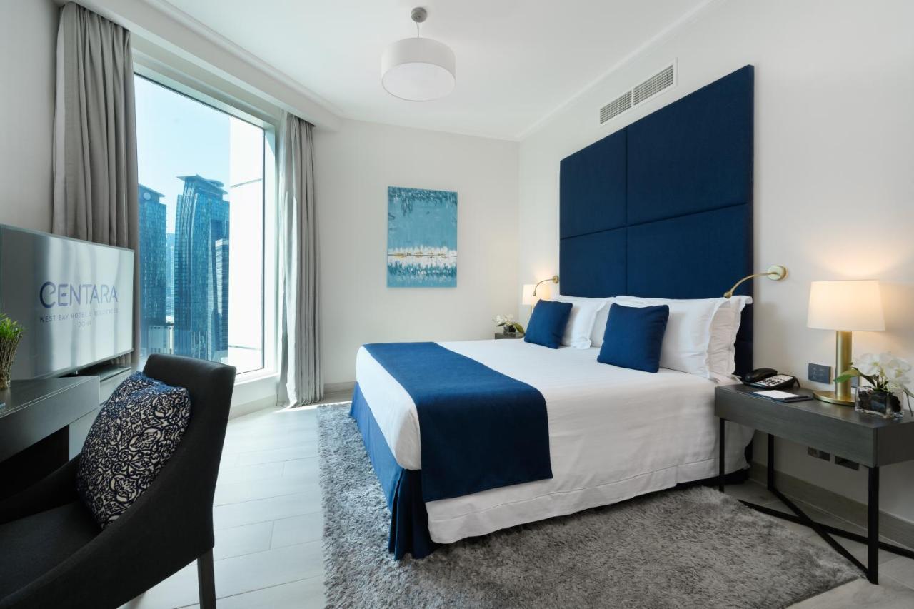 Centara West Bay Hotel & Residences Doha Exterior foto A bedroom at the Address Downtown Hotel