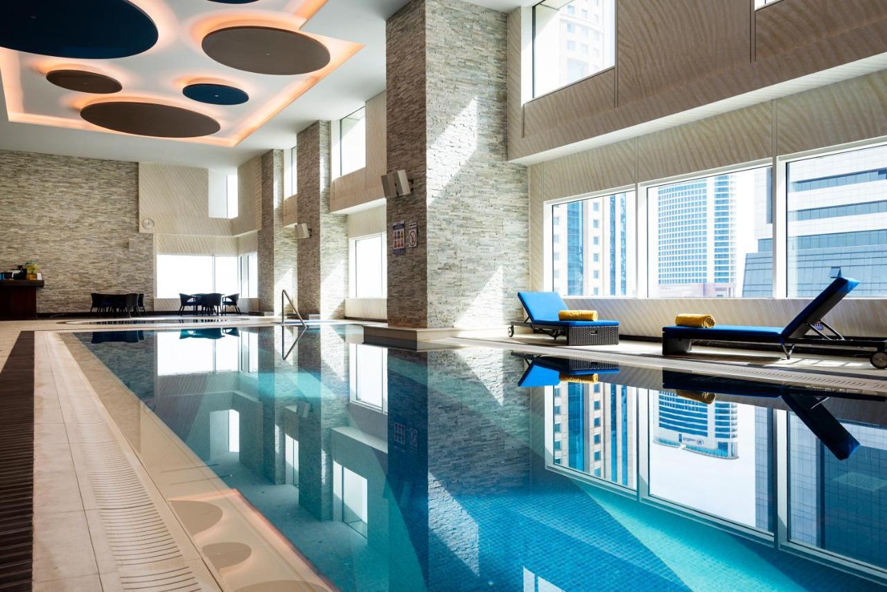 Centara West Bay Hotel & Residences Doha Exterior foto The pool at the hotel